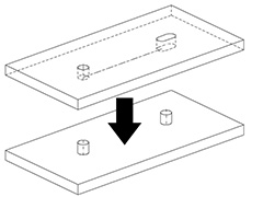 ピンと穴と長穴を用いた位置決め（左下図）